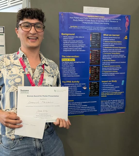 A presenter holding an award certificate beside a poster about gamifying critical care revision